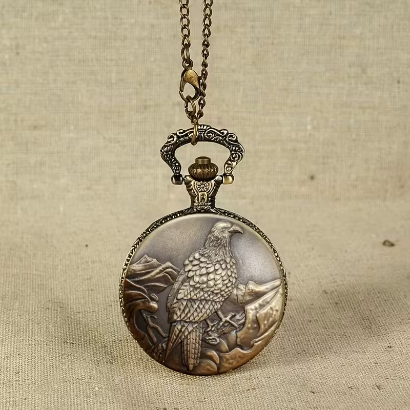 Reloj de águila suspendido de su cadena en tono bronce