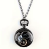 Reloj de bolsillo oscuro con 2 dragones yin yang y cadena