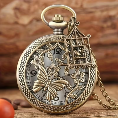 Reloj de bolsillo con mariposa calada, flores y un colgante en forma de jaula