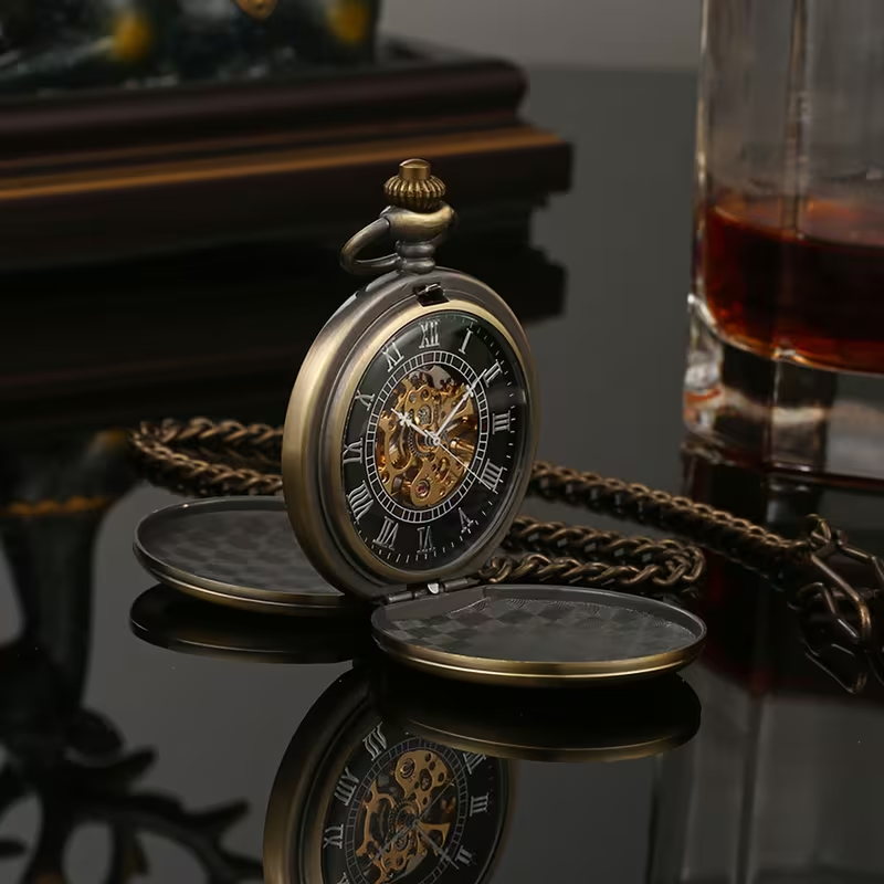 Reloj mecánico de esfera negra con ambas tapas abiertas