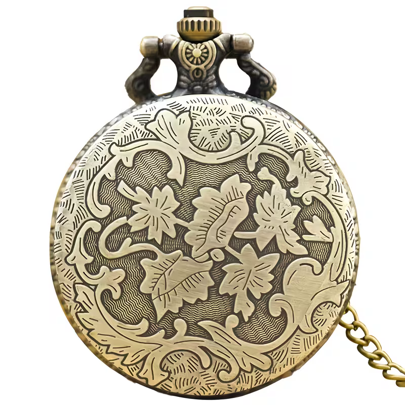 Reverso del reloj en tono bronce con un motivo de hojas